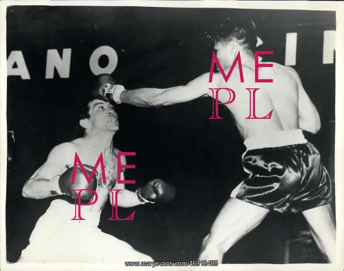 : Boxing. Jan. 16, 1956 - Pascual Perze of the Argentine retains his world : Boxing. Jan. 16, 1956 - Pascual Perze of the Argentine retains his world