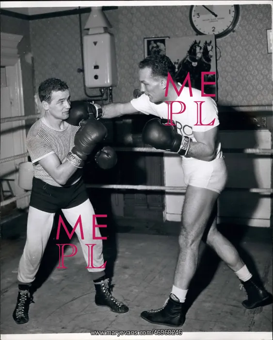 : Boxing. Feb. 28 Henry Cooper Spars with Paddy de Largey, one of his sparring partners : Boxing. Feb. 28 Henry Cooper Spars with Paddy de Largey, one of his sparring partners