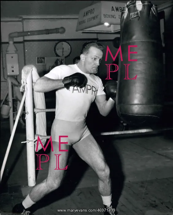 : Boxing. Mar. 31 Henry Cooper looks vicious as he slams away at the heavy : Boxing. Mar. 31 Henry Cooper looks vicious as he slams away at the heavy