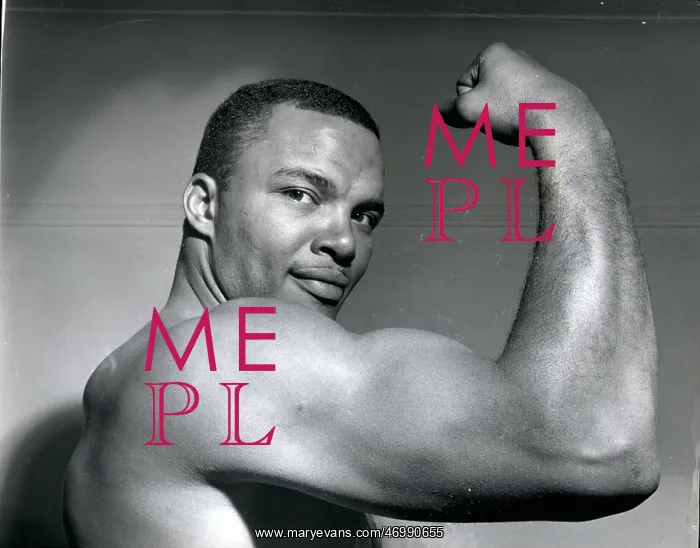 : Boxing. Oct. 10, 1961 - Eddie Machin - shows off his muscles : Boxing. Oct. 10, 1961 - Eddie Machin - shows off his muscles