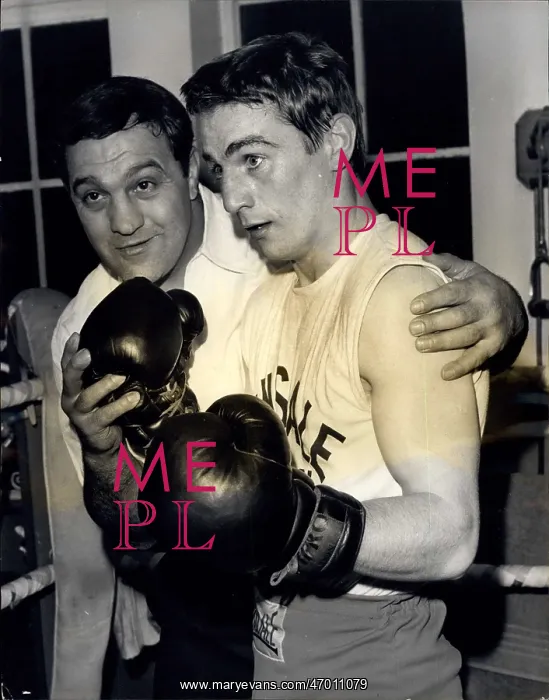 : Boxing. Mar. 11, 1965 - Rocky Marciano gives advice to Pat Dwyer. : Boxing. Mar. 11, 1965 - Rocky Marciano gives advice to Pat Dwyer.