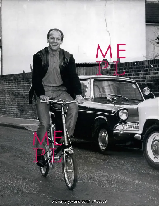  : Boxing. Sep. 09, 1965 - CYCLING IS PART OF HENRY COOPER TRAINING FOR NEXT