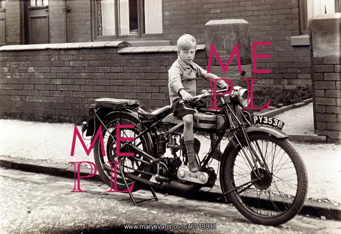 : Boy on a 1923 / 4 Triumph motorcycle : Boy on a 1923 / 4 Triumph motorcycle