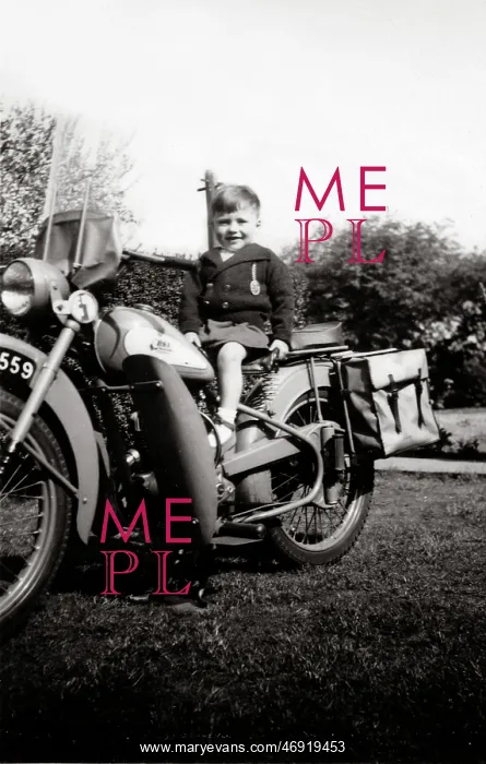 : Boy on a 1951 / 2 BSA Bantam motorcycle : Boy on a 1951 / 2 BSA Bantam motorcycle
