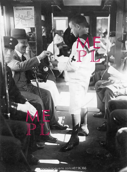 : Boy collects for the German Red Cross, 1914 : Boy collects for the German Red Cross, 1914