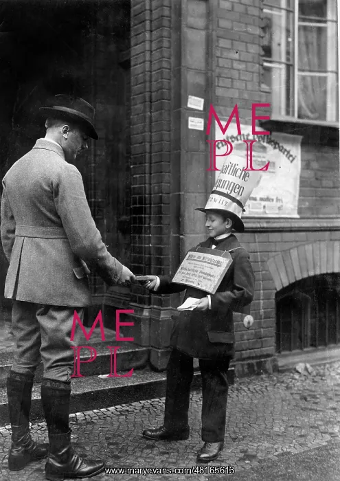 : Boy while distributing electoral advertisement during the Re : Boy while distributing electoral advertisement during the Re