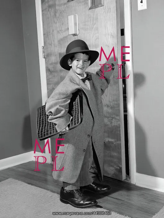 : Boy dressed in father's clothes holding attache : Boy dressed in father's clothes holding attache