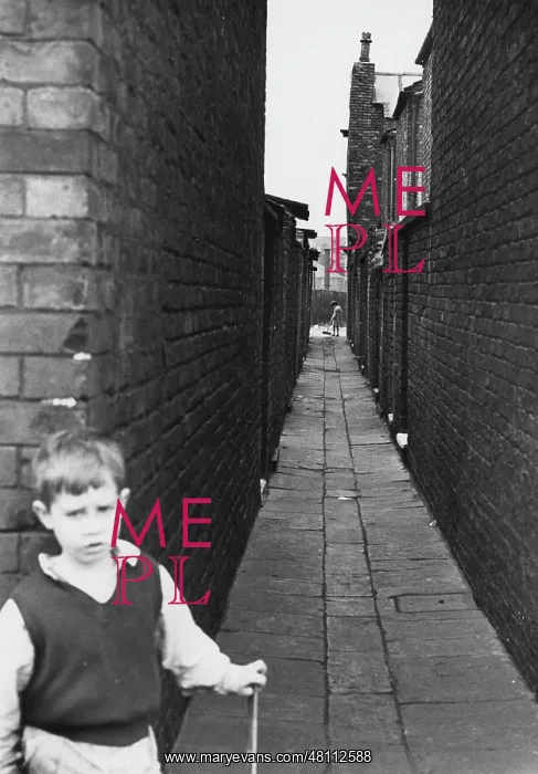 : Boy at the entrance to an alleyway : Boy at the entrance to an alleyway