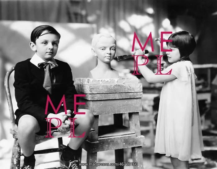 : Boy and girl in an artist studio : Boy and girl in an artist studio