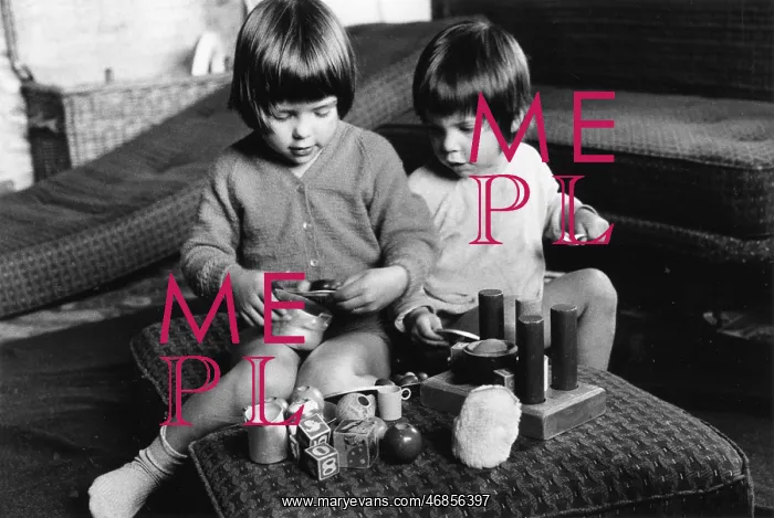 : Boy and girl playing with their toys : Boy and girl playing with their toys