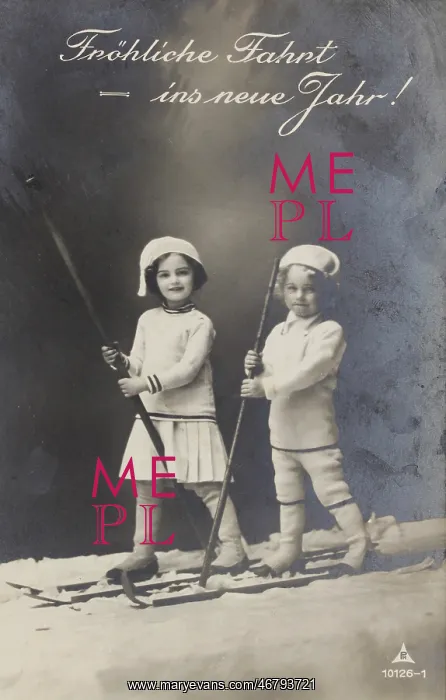 : Boy and girl on skis : Boy and girl on skis