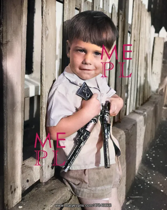 : Boy with two guns, Balham, SW London : Boy with two guns, Balham, SW London