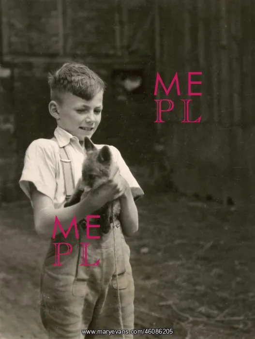  : Boy holding a fox cub