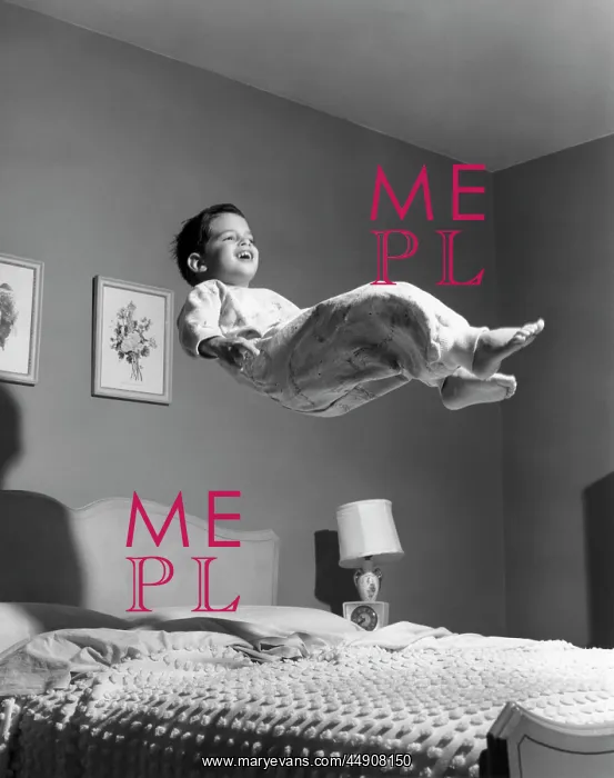  : Boy in pajamas elevated above bed