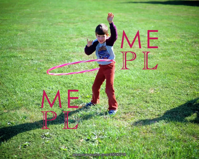 : Boy Playing with Hula Hoop : Boy Playing with Hula Hoop