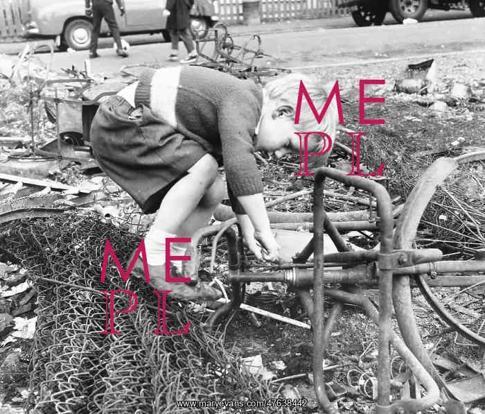 : Boy playing with junk, Balham, SW London : Boy playing with junk, Balham, SW London