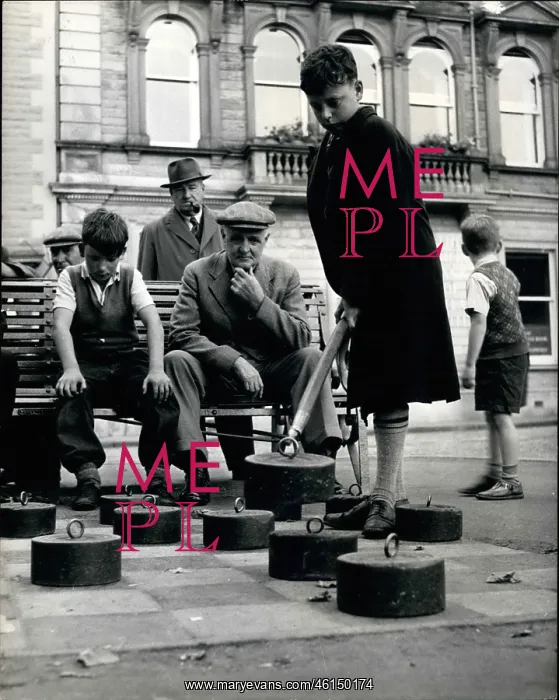: Boy playing open air draughts in Crieff, Scotland : Boy playing open air draughts in Crieff, Scotland
