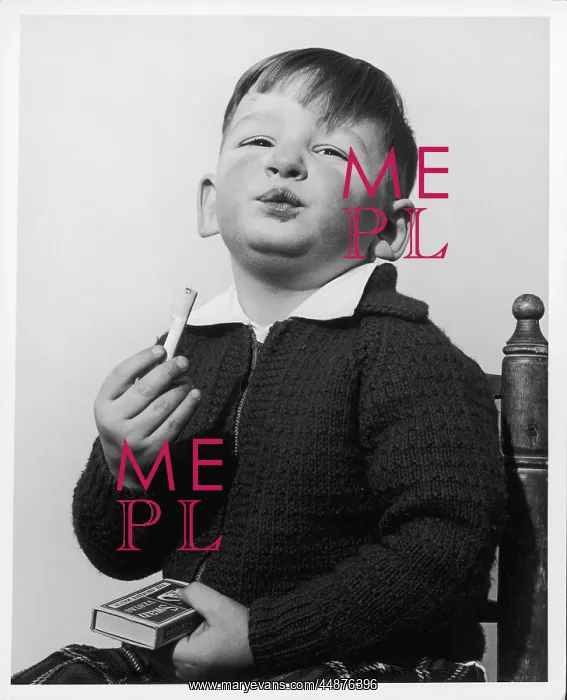  : BOY PRETENDS TO SMOKE