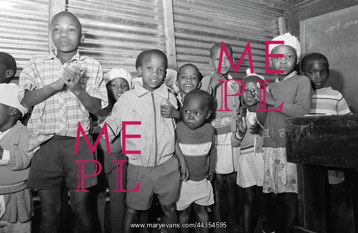: Boy reciting poem; Children singing at Rooigrond school : Boy reciting poem; Children singing at Rooigrond school
