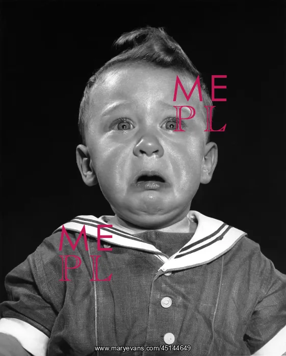  : Boy in sailor suit looking up and crying