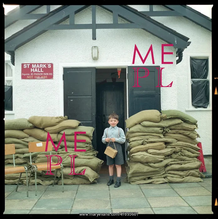 : BOY & SANDBAGS 1940S : BOY & SANDBAGS 1940S