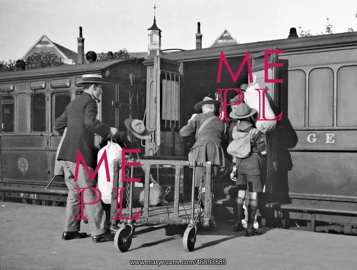 : Boy scouts boarding a railway train : Boy scouts boarding a railway train