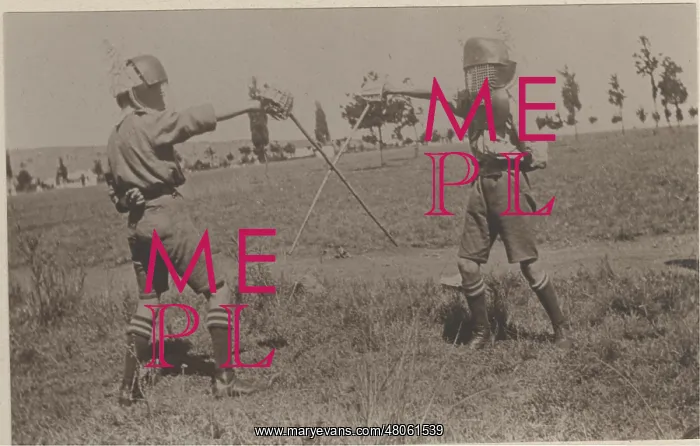 : Two boy scouts fencing at camp : Two boy scouts fencing at camp