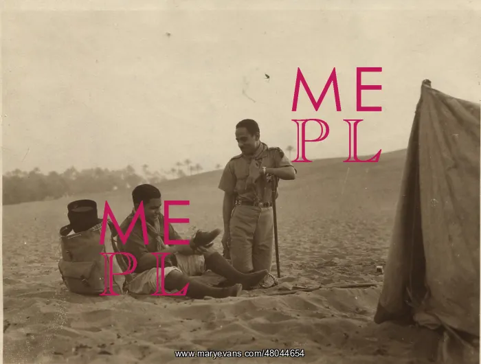 : Boy scouts sitting by tent in desert, Egypt : Boy scouts sitting by tent in desert, Egypt