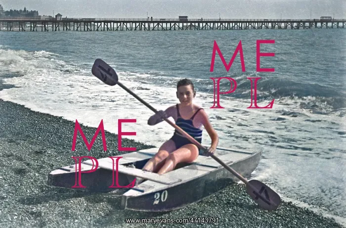  : Boy at the seaside on a raft
