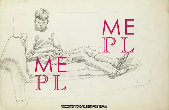 : Boy sitting on a two-seat sofa : Boy sitting on a two-seat sofa