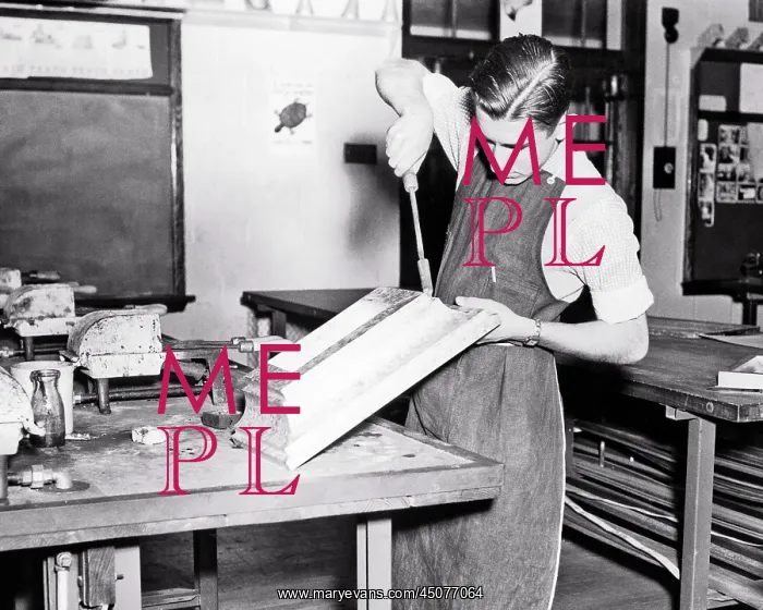 : Boy Student learning to solder - Tin Building : Boy Student learning to solder - Tin Building