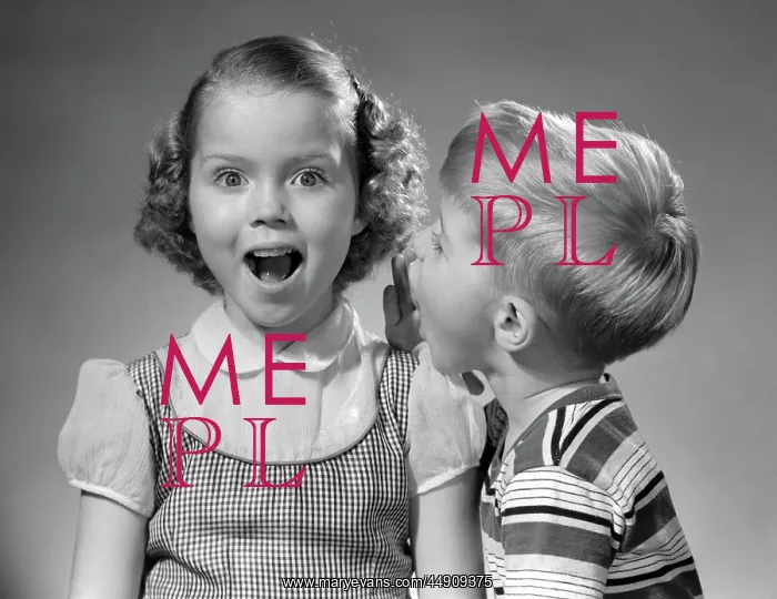 : Boy whispering in girl's ear