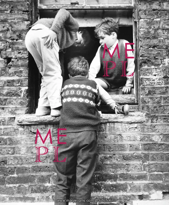 : Boys at a boarded up window, Balham, SW London : Boys at a boarded up window, Balham, SW London
