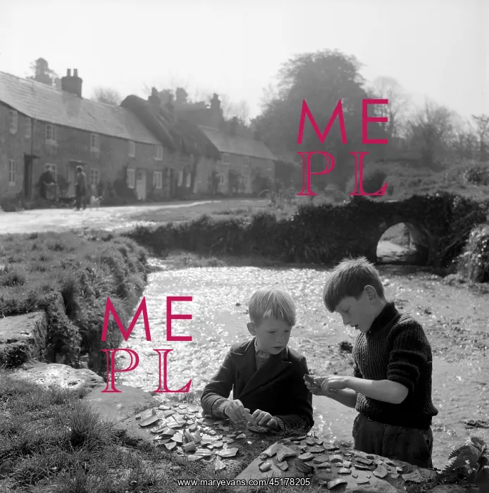 : Boys collecting pottery pieces : Boys collecting pottery pieces