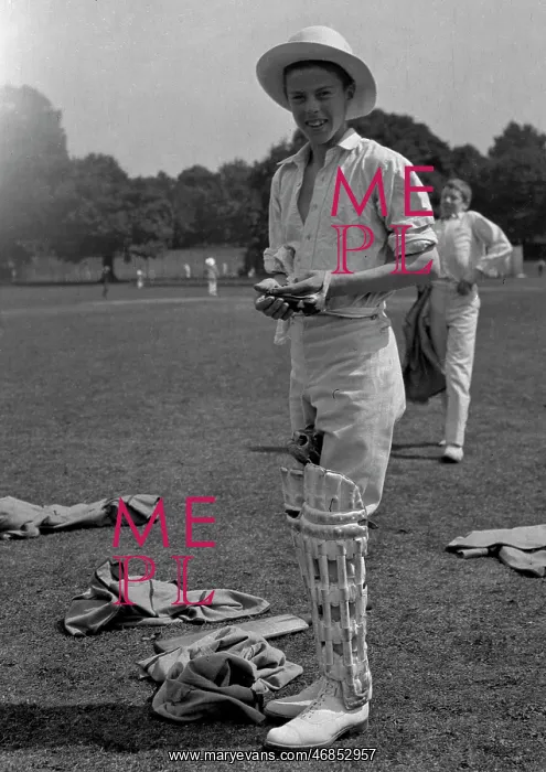 : Two boys in their cricketing gear : Two boys in their cricketing gear