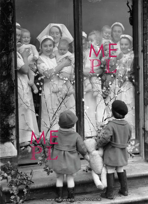 : Two boys in front of an orphanage : Two boys in front of an orphanage
