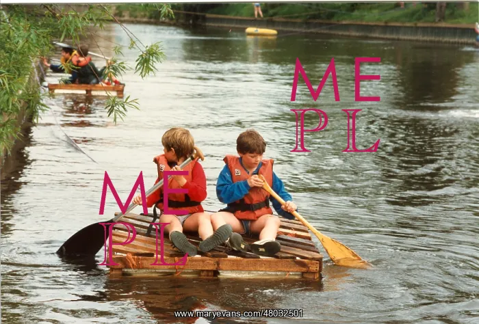 : Boys paddling a crate, Longridge Centre : Boys paddling a crate, Longridge Centre