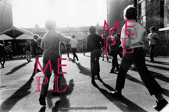 : Boys play in a primary school playground : Boys play in a primary school playground