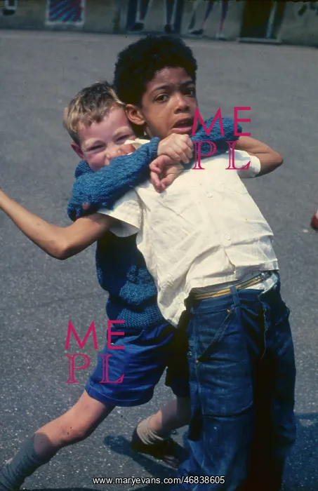 : Two boys in the playground at a Kilburn school : Two boys in the playground at a Kilburn school