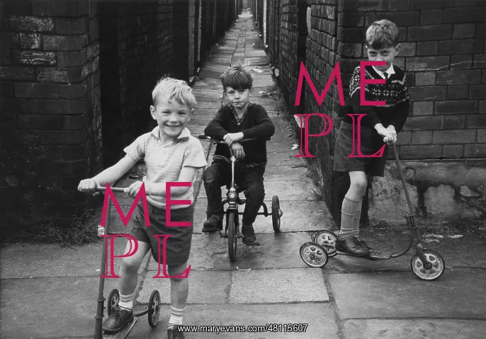  : Three boys playing in an alleyway