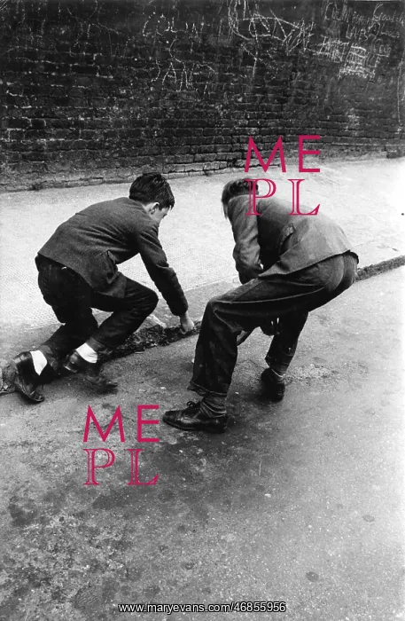 : Two boys playing in the gutter, West London : Two boys playing in the gutter, West London