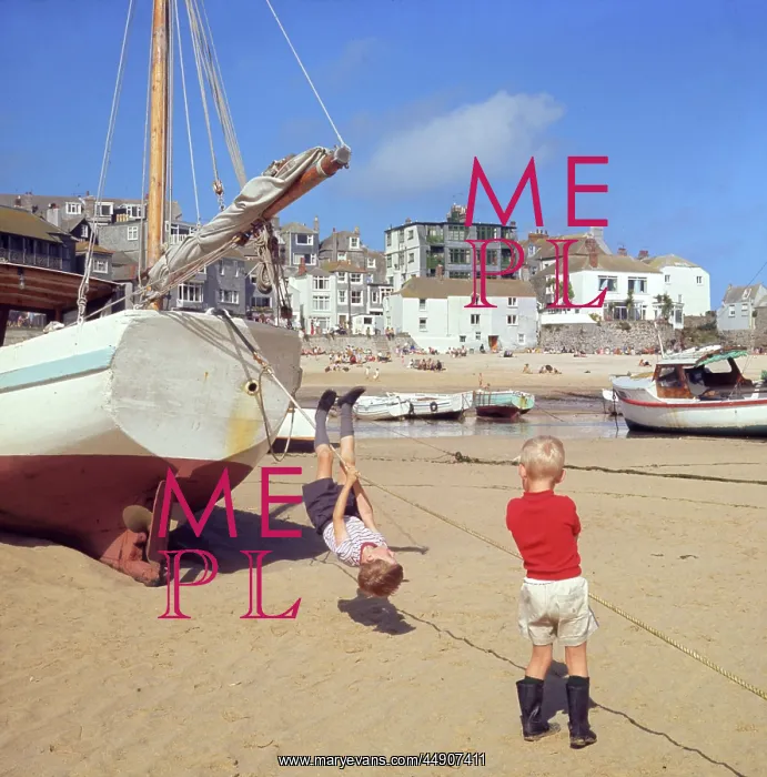 : Two boys playing in the harbour, St Ives, Cornwall : Two boys playing in the harbour, St Ives, Cornwall