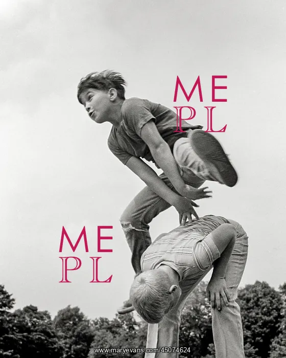 : Two Boys playing Leapfrog One Vaulting over the : Two Boys playing Leapfrog One Vaulting over the