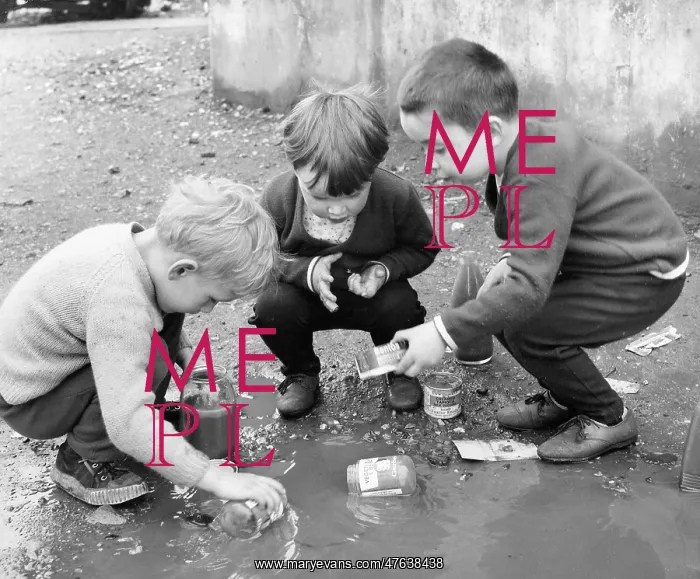 : Boys playing in a puddle, Balham, SW London : Boys playing in a puddle, Balham, SW London