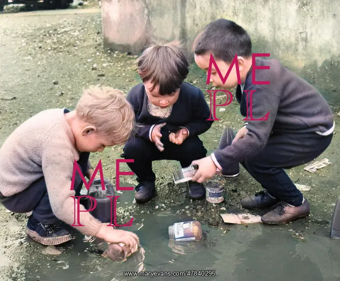 : Boys playing in a puddle, Balham, SW London : Boys playing in a puddle, Balham, SW London