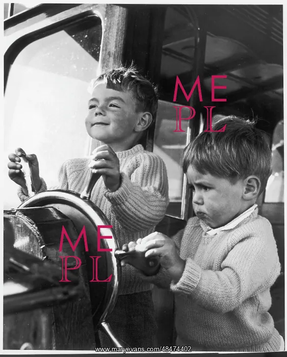 : BOYS PLAYING AT STEERING : BOYS PLAYING AT STEERING