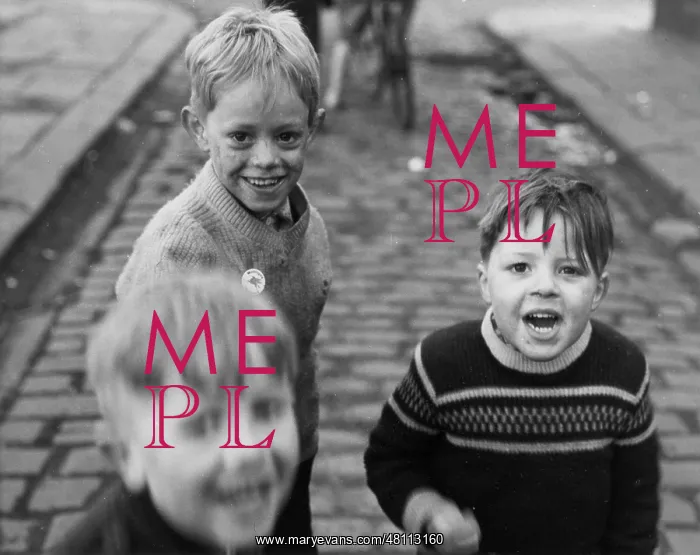 : Three boys playing in the street : Three boys playing in the street
