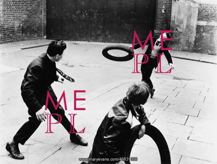 : Boys playing with tyres : Boys playing with tyres
