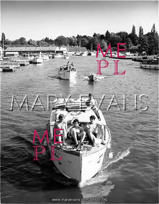  : BOYS ON A POWER BOAT