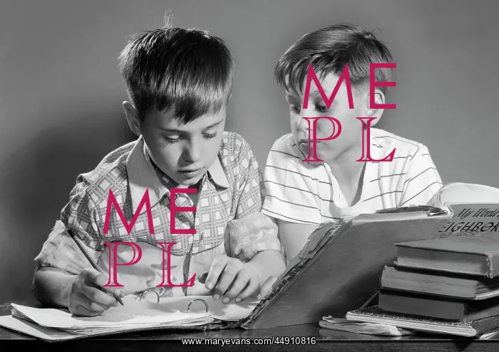 : Two Boys with Schoolbooks and Papers Studying Together In : Two Boys with Schoolbooks and Papers Studying Together In
